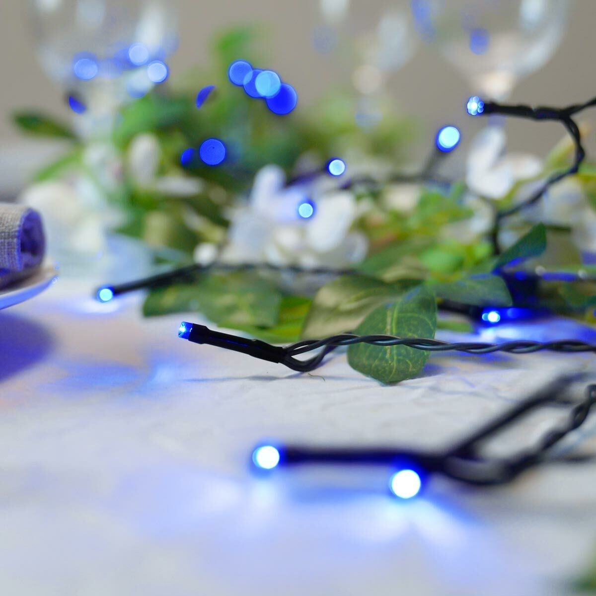Instalatie de Craciun liniara Yoto, 10 m, din care 1 m cablu priza 220V, 100 LED, 8 jocuri de lumini, controler, fir negru, albastru-4