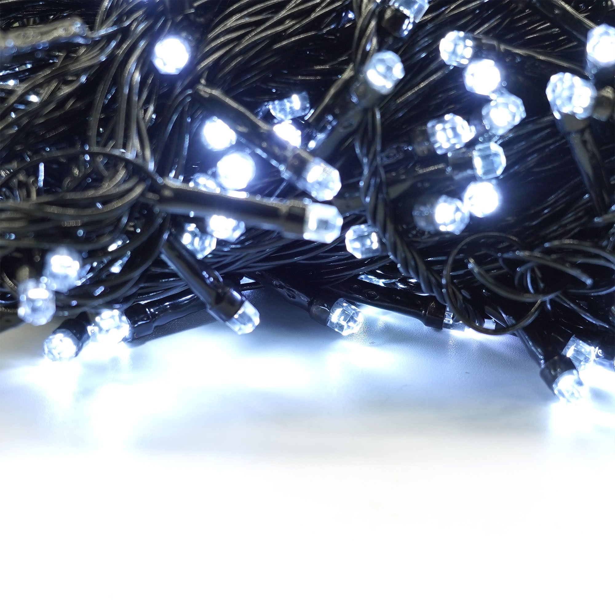 Instalatie de Craciun liniara Yoto, 17 m, din care 1 m cablu priza 220V, 200 LED, 8 jocuri de lumini, beculet in 6 colturi, pentru interior, controler, fir negru, alb rece-6