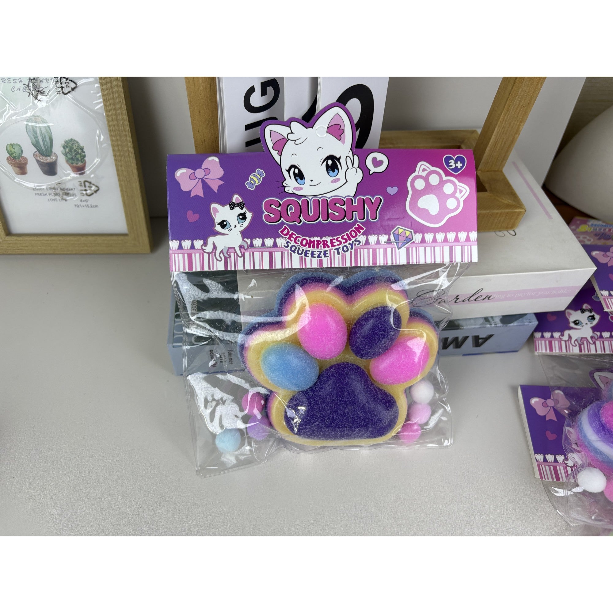 Jucarie Antistres Squishy, Flippy, cu Revenire Lenta, Model Labuta de Pisica Pufoasa, 12.5x10.5 cm, 220g, Squeeze Pinch Family, Ambalaj Transparent, Mov-Multicolor-0