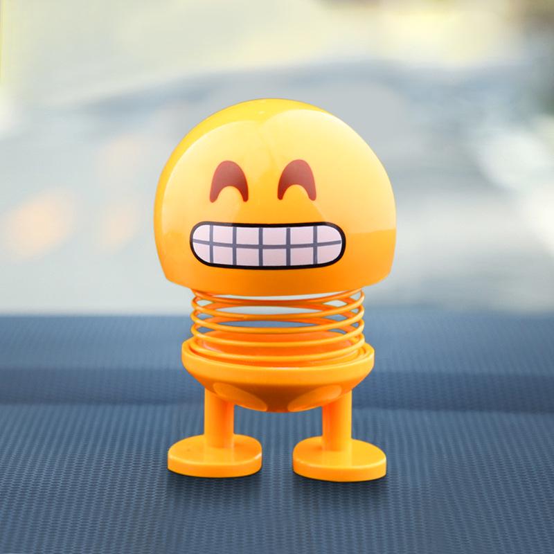 Jucarie cu arc pentru bordul masinii, emoticon galben