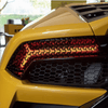 Set 2 folii autoadezive decupate pentru decorarea stopurilor auto, dimensiune 2 x 48 x 30cm, culoare Negru Mat, model HONEYCOMB TRIANGLE-0