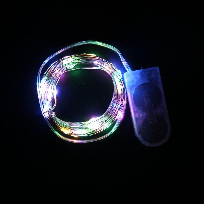 Instalatie Craciun, 5 metri, 50 LED-uri, Multicolor, cu baterii CR 2032 incluse, fir cupru, liniar, interior/exterior, Flippy-2