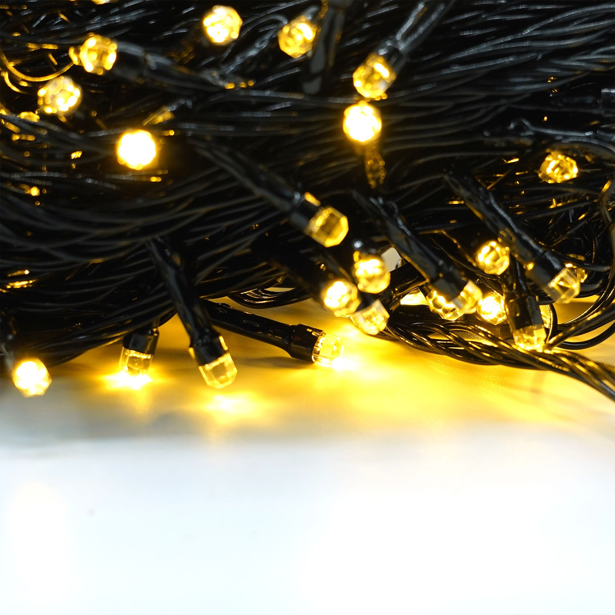 Instalatie de Craciun liniara Yoto, 17 m, din care 1 m cablu priza 220V, 200 LED, 8 jocuri de lumini, beculet in 6 colturi, pentru interior, controler, fir negru, alb cald-2