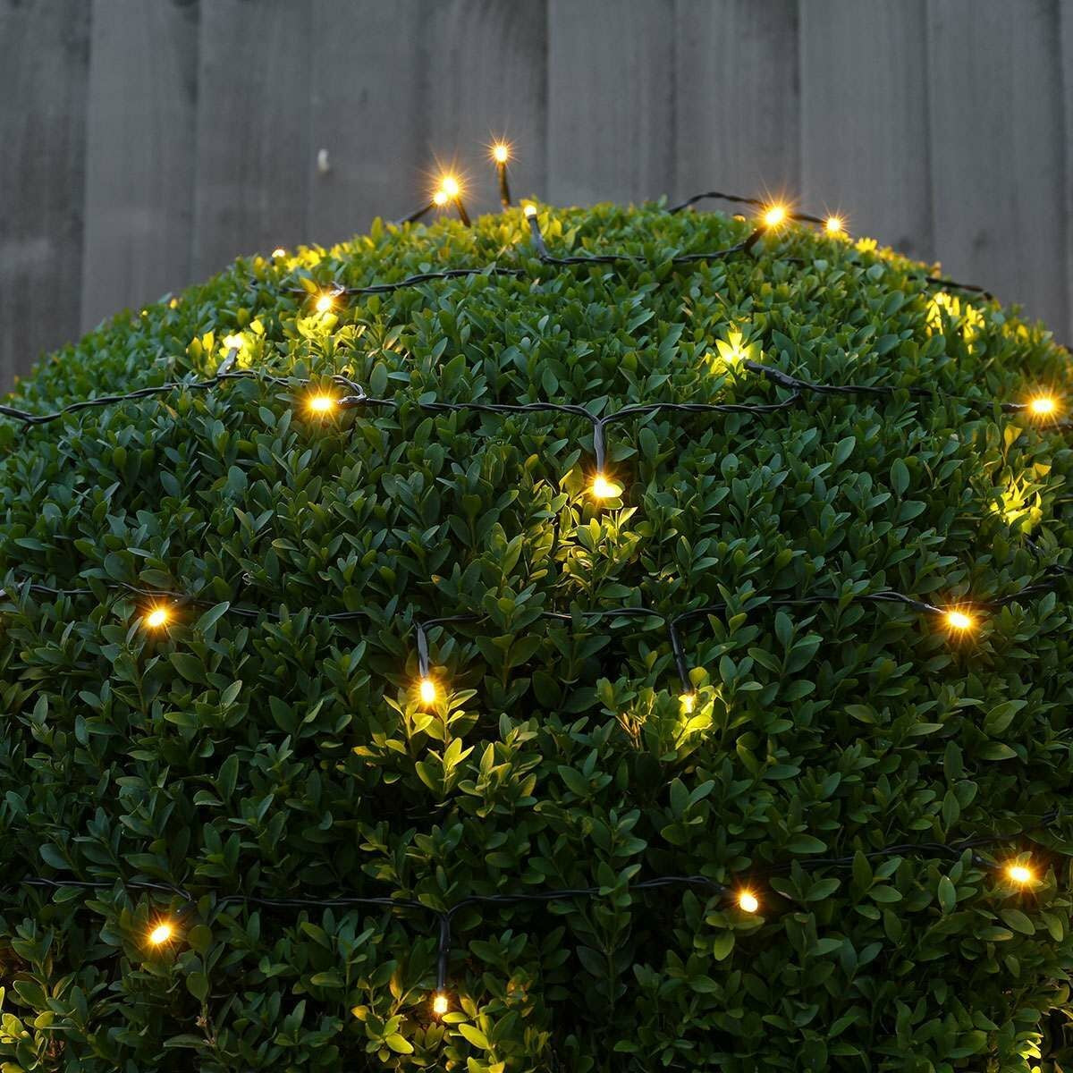 Instalatie de Craciun liniara Yoto, 17 m, din care 1 m cablu priza 220V, 200 LED, 8 jocuri de lumini, beculet in 6 colturi, pentru interior, controler, fir negru, alb cald-7