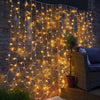 Instalatie Craciun, Tip Perdea, IP44, 9 m x 3 m, 720 LED-uri, Alb Cald, cu 8 jocuri de lumini, 31 V, 9W, Interconectabila, Prelungitor 3 m inclus, Fir transparent, Interior/ Exterior, Flippy-0