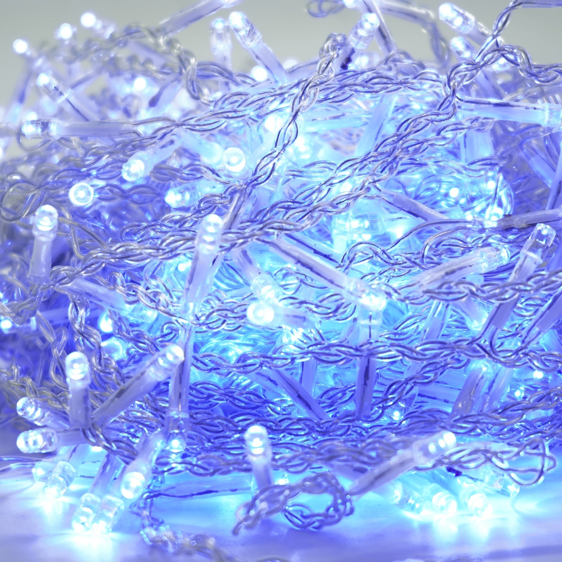 Instalatie Craciun Yoto, Tip Franjuri/Turturi, 12 m, 300 LED-uri, Prelungitor 1.5 m, 8 Jocuri de Lumini, Interconectabila, Conectare la Retea, Fir transparent, Interior/Exterior, Albastru-1