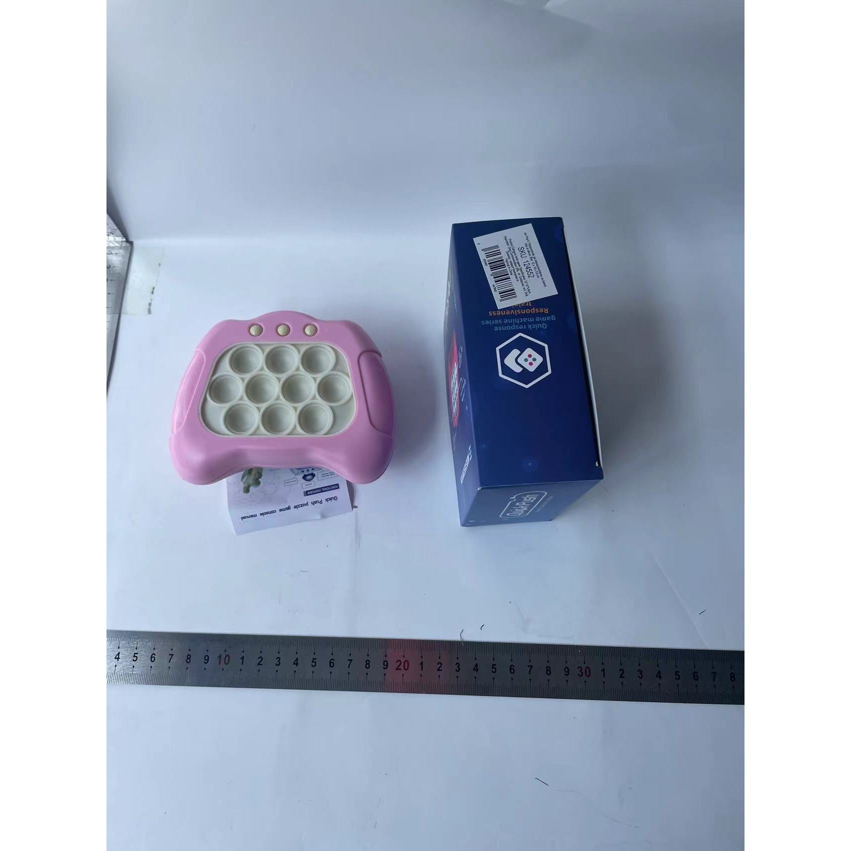 Joc Pop It, Flippy, consola, joc interactiv, antistres, cu baterii, Abs si silicon, Roz, 12 x 10 x 5.8 cm-7
