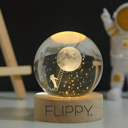 Lampa LED Decorativa, Flippy, cu Bila de Cristal cu Diametru 6cm, Model Astronaut pe Scara catre Luna 3D, Alimentare USB, Suport din Lemn, Lumina Alb Cald-5