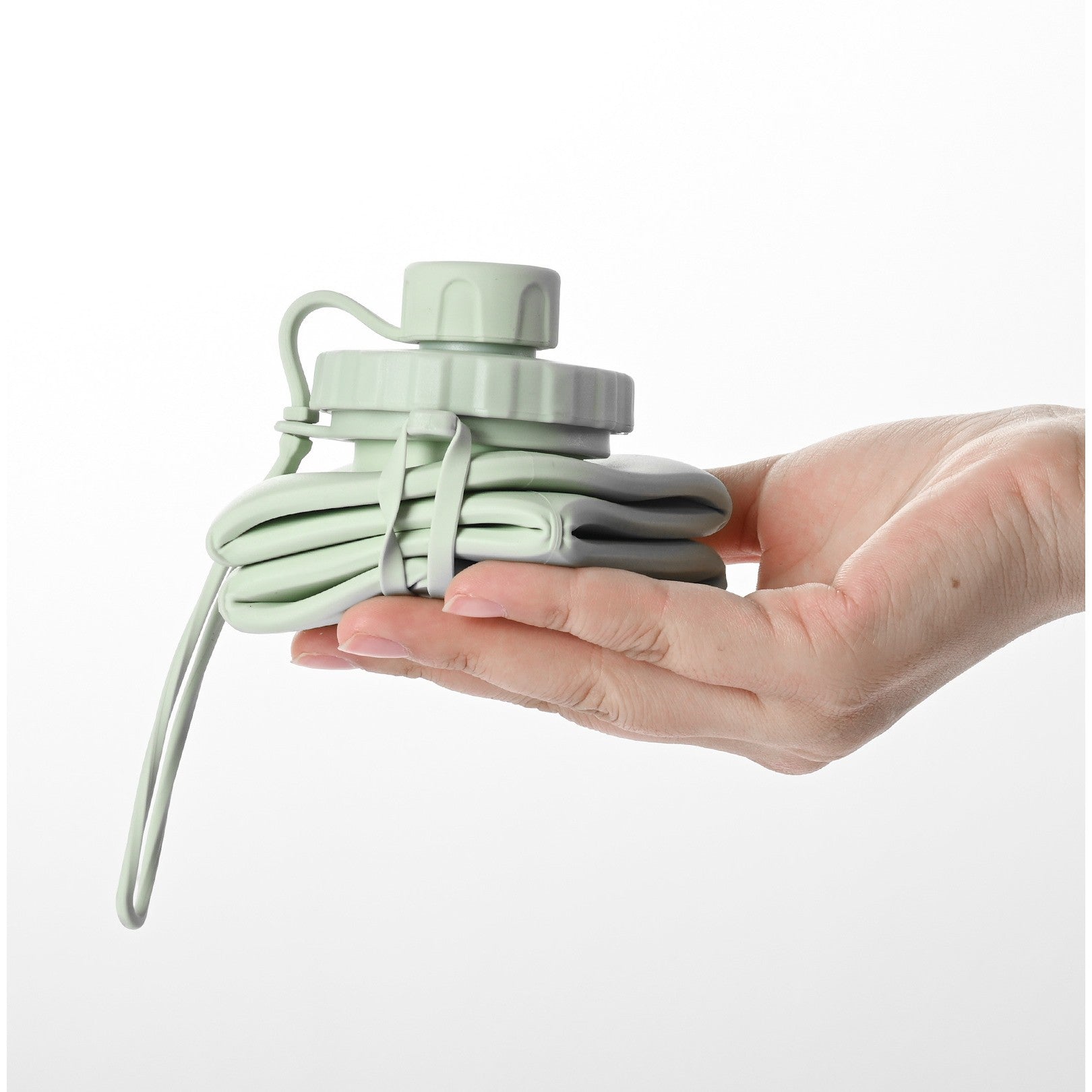 Sticla de apa pliabila Flippy, din silicon,reutilizabila, rezistenta la temepreturi ridiate, usor de depozitat si carat, 22 x 7.8 cm, 600 ml, verde-1