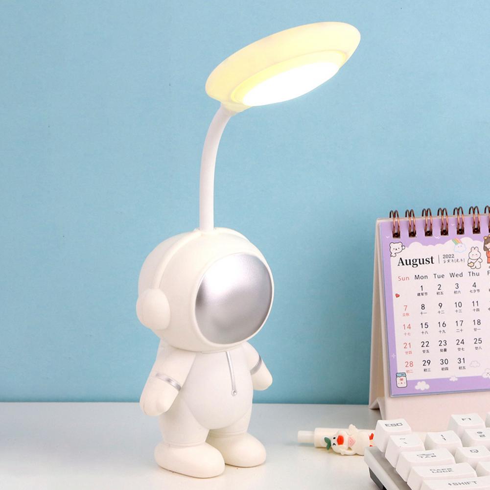 Lampa de birou cu suport pentru telefon, in forma de Astronaut